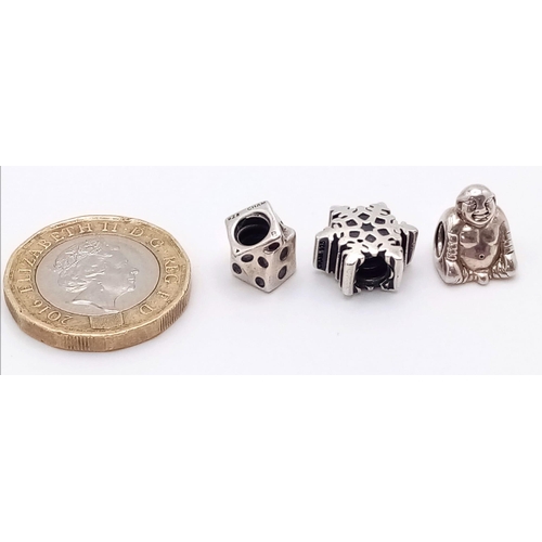 983 - A SELECTION OF 3 STERLING SILVER CHAMALIA CHARMS TO INCLUDE: SNOWFLAKE, BUDDHA & DICE 9.4G

SC 4140