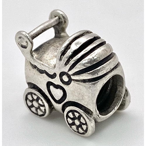 990 - A STERLING SILVER PANDORA PRAM CHARM 3.4G , 1cm x 1cm

SC 4141