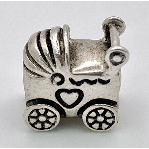 990 - A STERLING SILVER PANDORA PRAM CHARM 3.4G , 1cm x 1cm

SC 4141