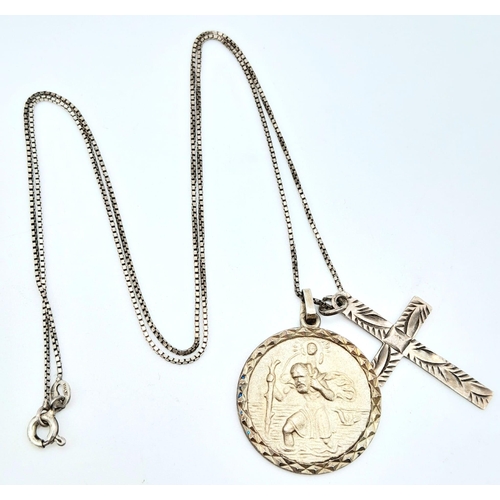 998 - A vintage sterling silver necklace with silver St Christopher and cross pendants. Total weight 7.2G.... 