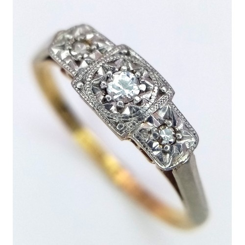 612 - An Antique 18K Yellow Gold and Diamond Trilogy Ring. Three diamonds in a platinum setting. Size O. 2... 