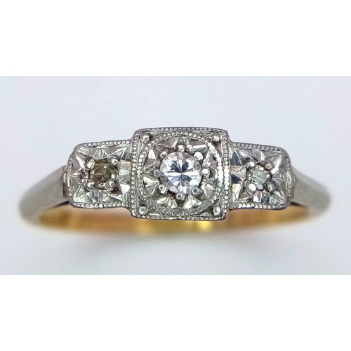 612 - An Antique 18K Yellow Gold and Diamond Trilogy Ring. Three diamonds in a platinum setting. Size O. 2... 