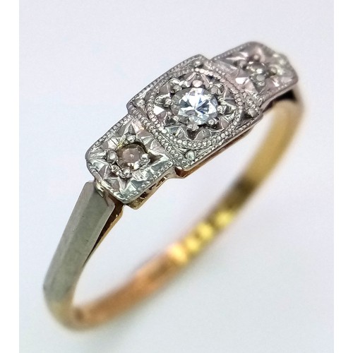 612 - An Antique 18K Yellow Gold and Diamond Trilogy Ring. Three diamonds in a platinum setting. Size O. 2... 