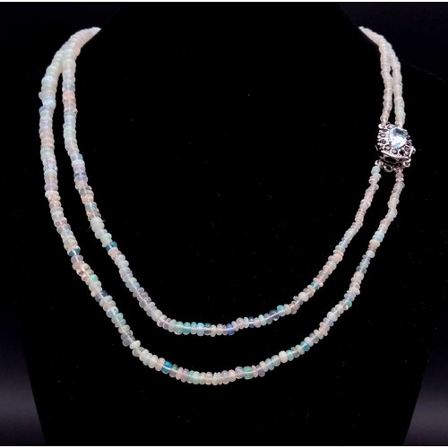 673 - An Ethiopian Opal 2 Strand Necklace with an Aquamarine 925 Silver Pendant Clasp. Small colour-play r... 