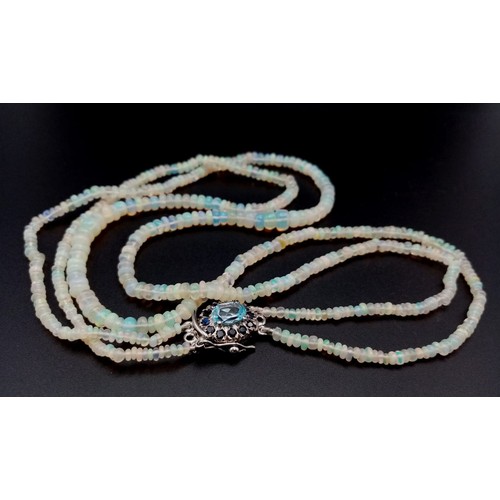 673 - An Ethiopian Opal 2 Strand Necklace with an Aquamarine 925 Silver Pendant Clasp. Small colour-play r... 