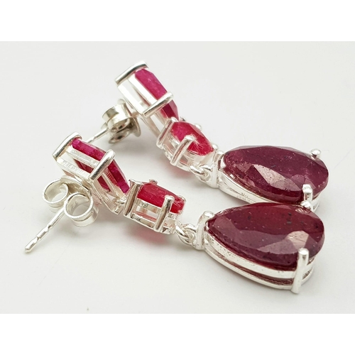 1250 - A Pair of Ruby Drop Earrings on 925 Silver. 3.7cm length, 8.94g total weight.    Ref: CD- 1204