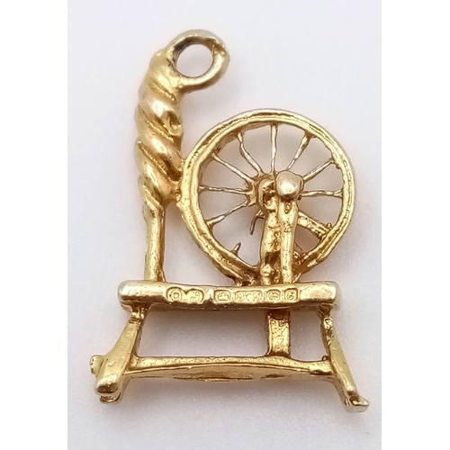 1461 - A Vintage 9K Yellow Gold Spinning Wheel Pendant/Charm. 2cm. 1.5g weight.