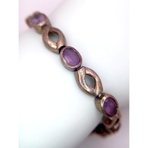 963 - A vintage 925 silver  Amethyst link bangle. Total weight 21.7G. Total length 22cm.