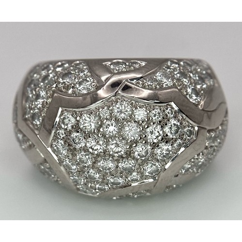 29 - A Chanel, Designer 18K White Gold Diamond Encrusted Ring. This head-turning piece has approximately ... 