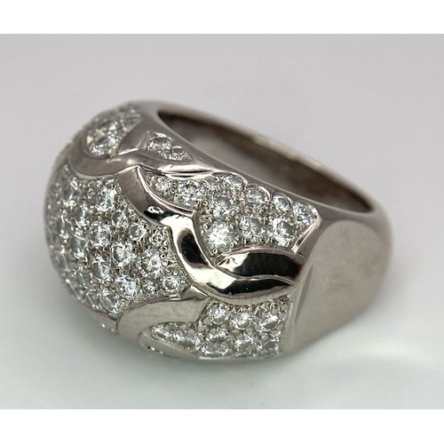 29 - A Chanel, Designer 18K White Gold Diamond Encrusted Ring. This head-turning piece has approximately ... 