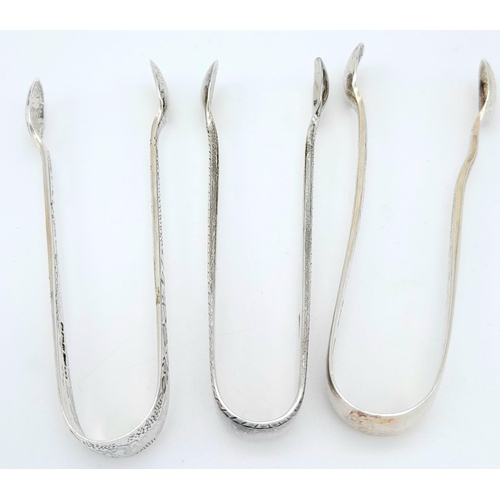 1497 - 3X antique sterling silver sugar tongs with different designs. 2 of them come with Full London hallm... 