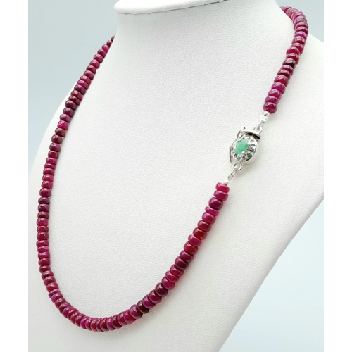 1213 - A Ruby Cabochon Necklace with Emerald and 925 Silver Clasp. 180ctw. 47cm length, 35.34g total weight... 