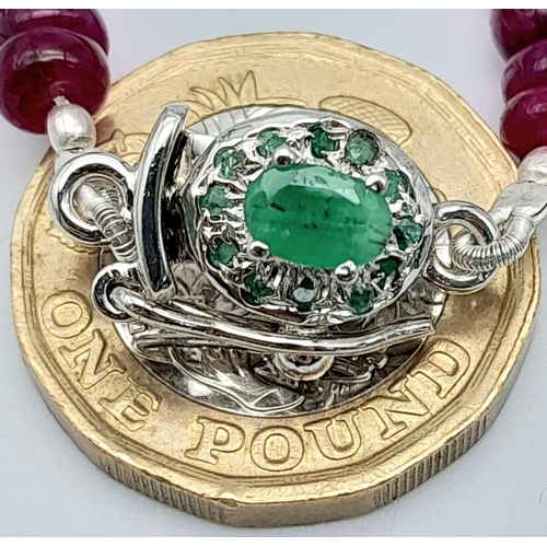 1213 - A Ruby Cabochon Necklace with Emerald and 925 Silver Clasp. 180ctw. 47cm length, 35.34g total weight... 