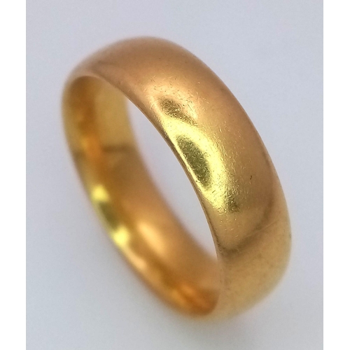 1221 - A 22K GOLD BAND RING .   6.6gms   size M