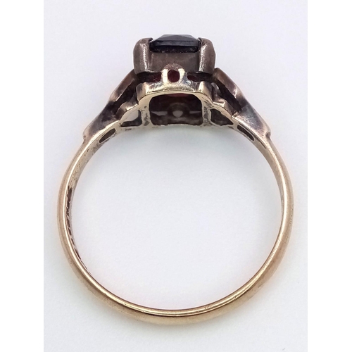 1320 - A Vintage 9K Yellow Gold Garnet Ring. Size M. 2.4g weight.