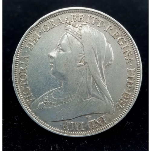 1328 - An 1897 Queen Victoria Silver Crown. VF grade but please see photos.