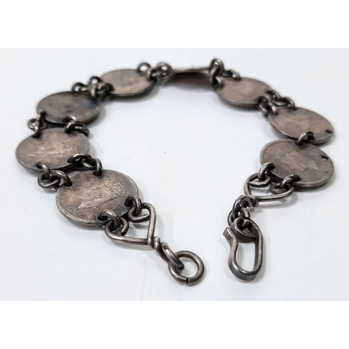 1389 - A vintage Georgian VI 1947 coins set link bracelet. Total weight 18.2G. Total length 21cm.