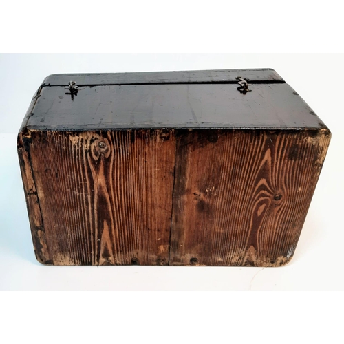 1394 - An Antique Wooden Box with an Attached Badge of Slipper Chapel, Walsingham. 27cm x 15cm x 14cm.