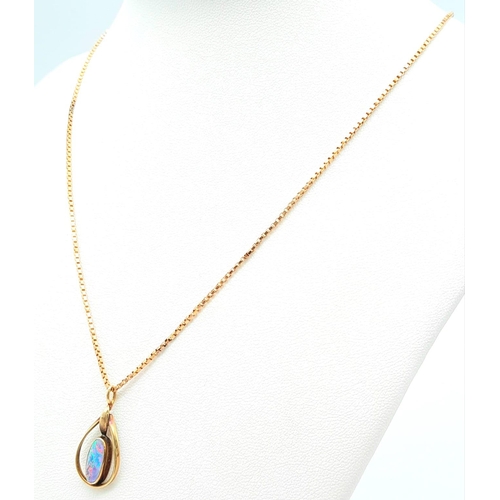 1397 - A Vintage 9K Gold Black Opal Pendant on a 9K Gold Necklace. 
2cm. 48cm necklace length. 4.9g weight