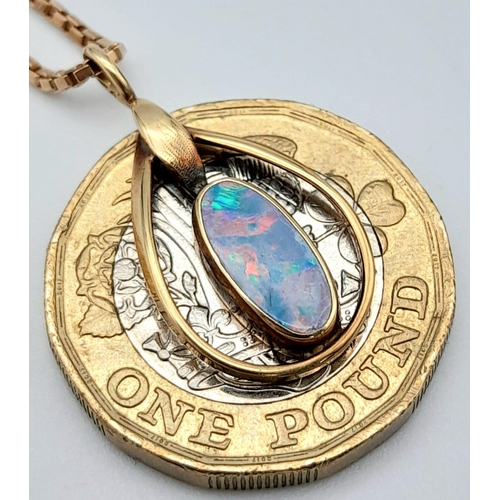 1397 - A Vintage 9K Gold Black Opal Pendant on a 9K Gold Necklace. 
2cm. 48cm necklace length. 4.9g weight