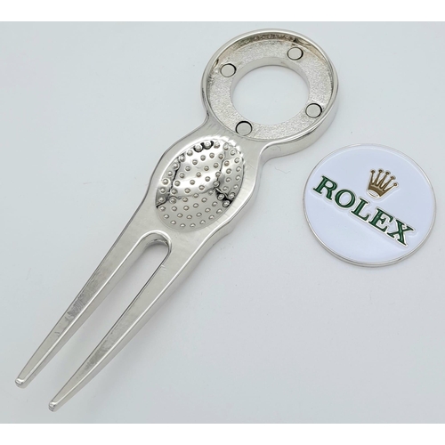 1413 - A Rolex Branded Golf Putting Repair Divot Tool. Pop out ball marker. As new. 8cm.