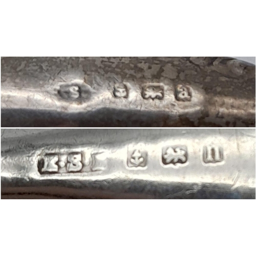 1439 - A vintage sterling silver handled nail file with full Birmingham hallmarks, 1900 and a silver handle... 