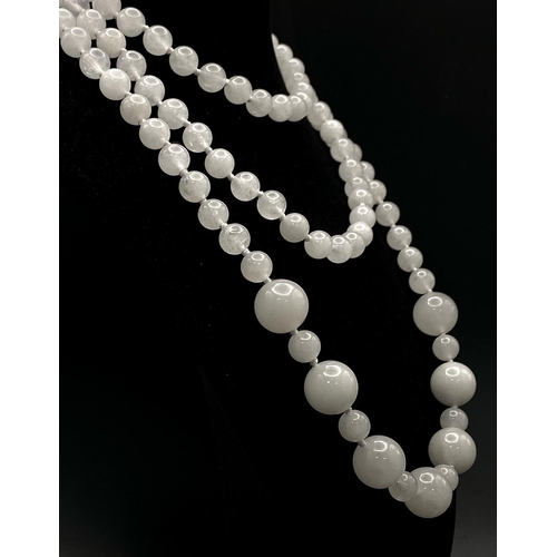 689 - A Rope Length Graduated White Jade Bead Necklace. Perfect for different wearing arrangements. 120cm ... 