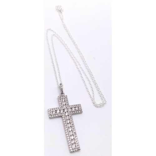 1493 - A Decorative White Stone Cross on a 925 Silver Disappearing Necklace. 4cm and 42cm