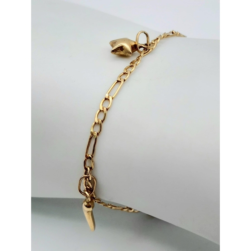 1347 - A 9K Yellow Gold Charm Bracelet. Six charms including, Dolphin and horn of plenty! 18cm. 2.11g total... 