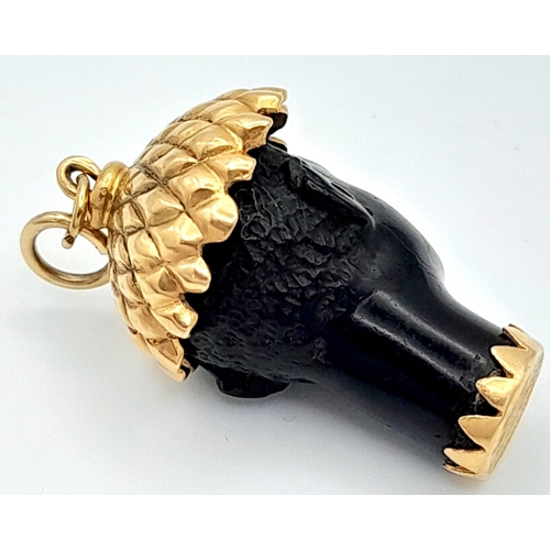 1360 - A NATIVE WEARING HAT IN HIGH CARAT GOLD PENDANT . 3.2gms