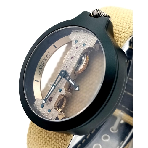 1248 - A Verticale Mechanical Top Winder Gents Watch. Cream textile strap. Black ceramic gilded skeleton ca... 