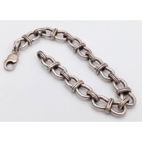 1463 - A vintage 925 silver chunky belcher link bracelet. Total weight 33.3G. Total length 22cm.