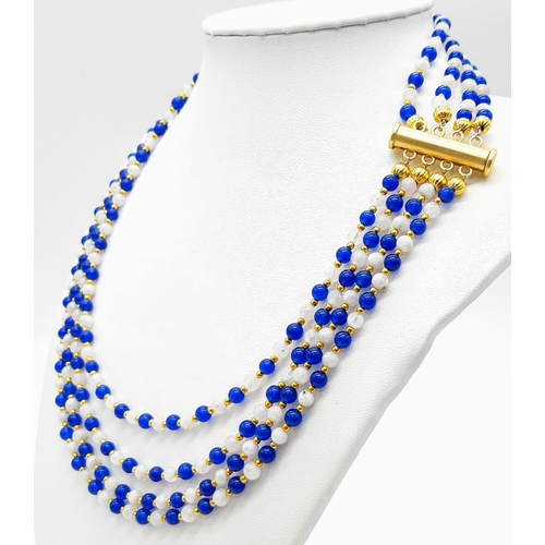 199 - A very elegant and sophisticated four strand necklace with alternating blue sapphires and moonstone ... 