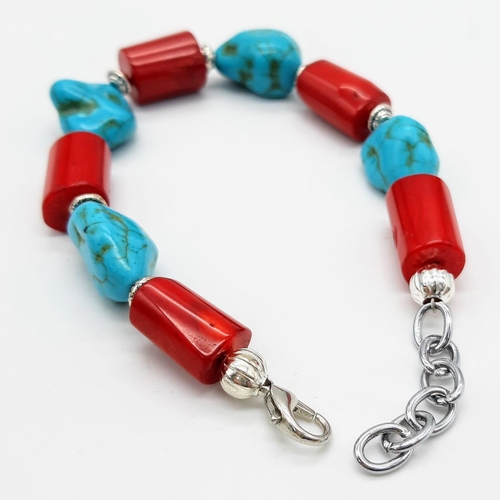 284 - A substantial, chunky red coral and turquoise nugget necklace, bracelet and earrings set, in a prese... 