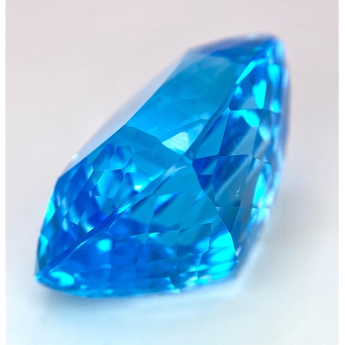 29 - A Huge 142ct London Blue Topaz Natural Gemstone. Rectangular cushion cut. 33mm x 28mm. No visible ma... 