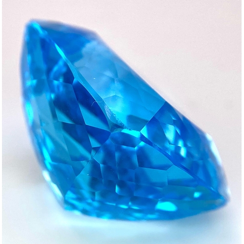 29 - A Huge 142ct London Blue Topaz Natural Gemstone. Rectangular cushion cut. 33mm x 28mm. No visible ma... 