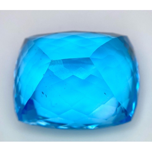 29 - A Huge 142ct London Blue Topaz Natural Gemstone. Rectangular cushion cut. 33mm x 28mm. No visible ma... 