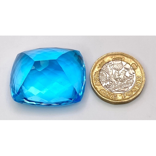 29 - A Huge 142ct London Blue Topaz Natural Gemstone. Rectangular cushion cut. 33mm x 28mm. No visible ma... 