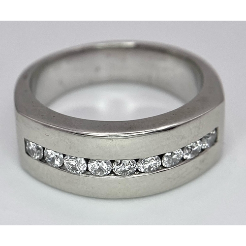 471 - A Designer 'Mosso' 18K White Gold and Diamond Ring. Nine bright white round cut diamonds. Size M. 9.... 