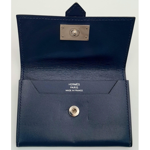 478 - A Small Blue Leather Hermes Ladies Wallet. Flap design with Letter H branding. In good condition but... 