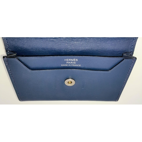 478 - A Small Blue Leather Hermes Ladies Wallet. Flap design with Letter H branding. In good condition but... 