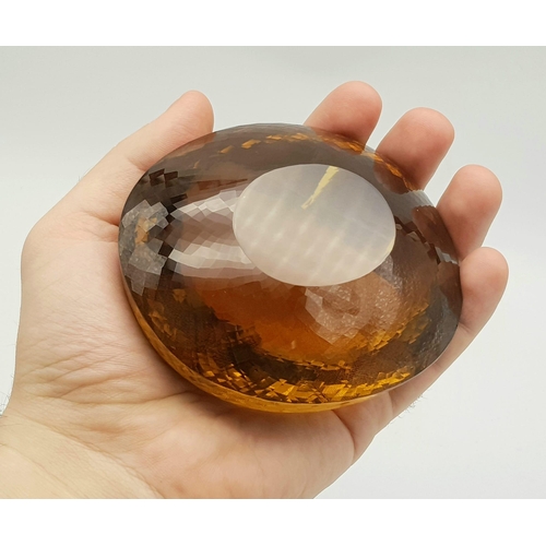 8 - An Immense 3632ct Citrine Quartz Gemstone. Oval cut and beautifully faceted. 10 x 9cm. Comes with a ... 