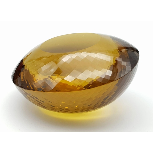 8 - An Immense 3632ct Citrine Quartz Gemstone. Oval cut and beautifully faceted. 10 x 9cm. Comes with a ... 