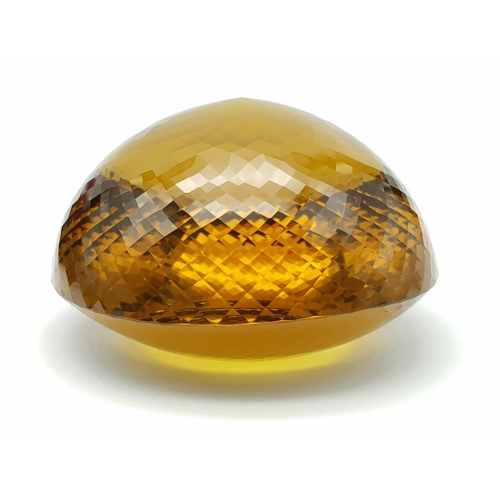 8 - An Immense 3632ct Citrine Quartz Gemstone. Oval cut and beautifully faceted. 10 x 9cm. Comes with a ... 