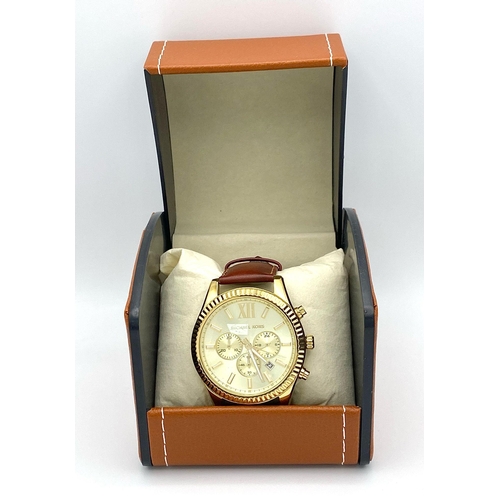 883 - A Designer Michael Kors Chronograph Gents Watch. Brown leather strap. Gilded case - 45mm. Cream dial... 