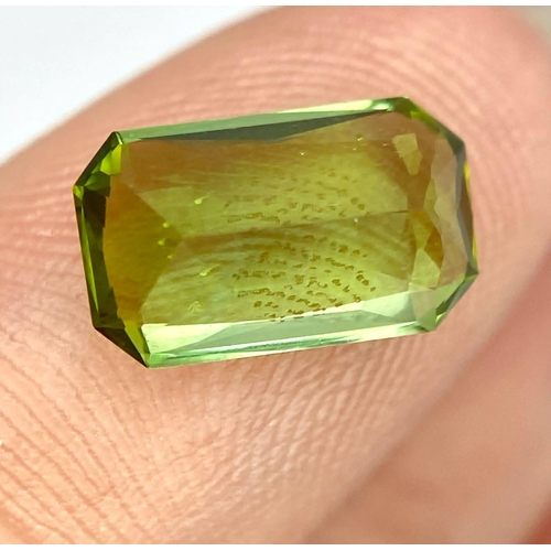 932 - A 2.43ct Bi-Colour Tourmaline Gemstone. Comes with a NGJA certificate.