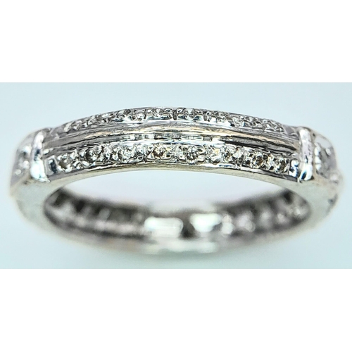 933 - An 18K White Gold Diamond Band Ring. Size K. 3g total weight.