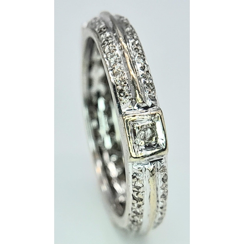 933 - An 18K White Gold Diamond Band Ring. Size K. 3g total weight.