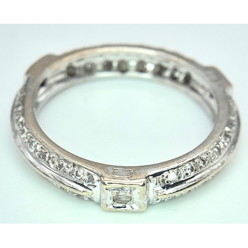 933 - An 18K White Gold Diamond Band Ring. Size K. 3g total weight.