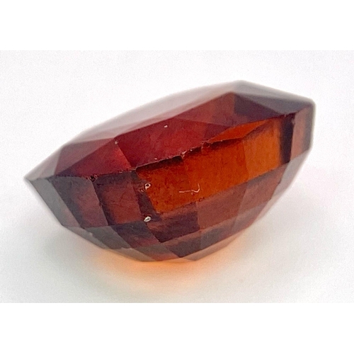 946 - A 8.52ct Hessonite Garnet. Comes with a NGJA certificate.